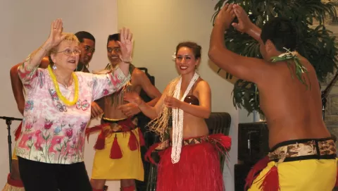 people dancing at luau