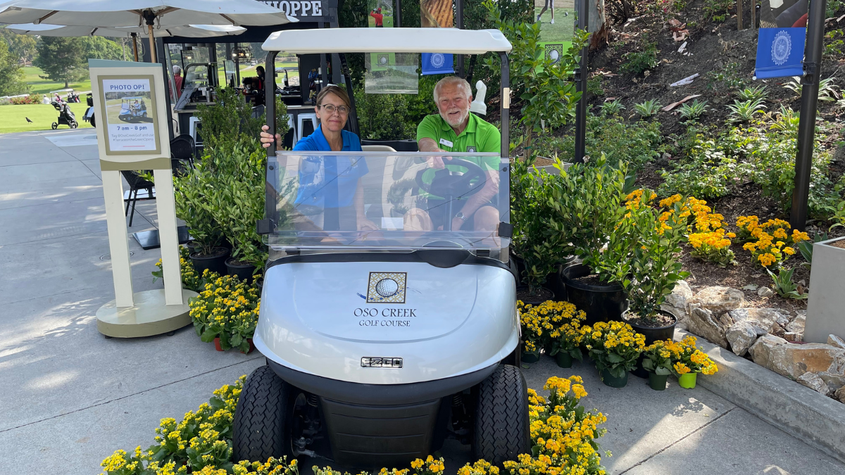 golf staff in cart