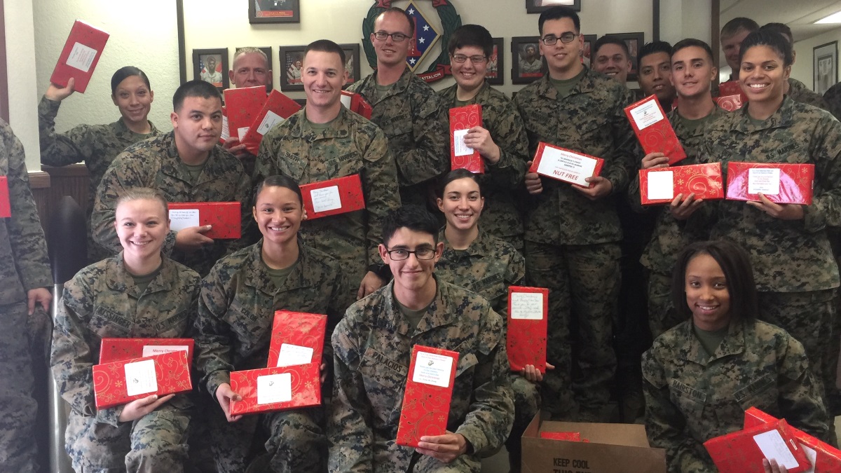 marines with sees candies boxes