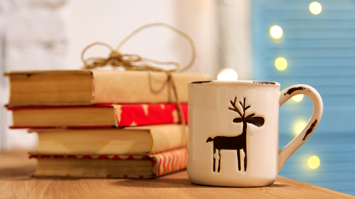 books and holiday mug