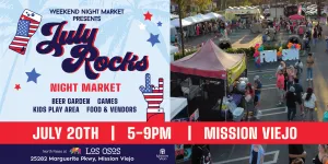 July 4th theme night market with booths in parking lot.