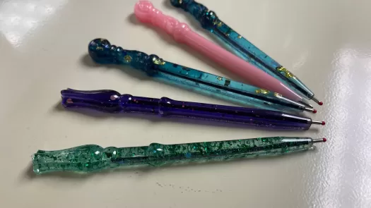 A collection of handmade resin pens