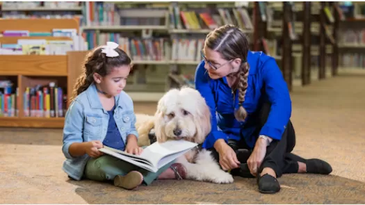 child reading to dog
