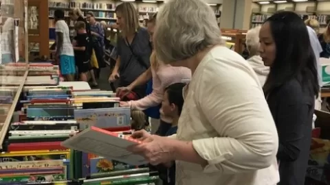 people looking at books