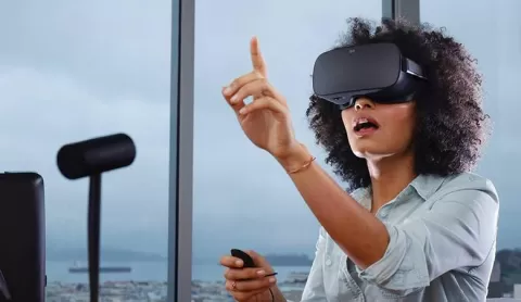person wearing Oculus Rift virtual reality headset