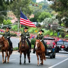 officers on horses leading the walk