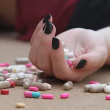 hand full of pills