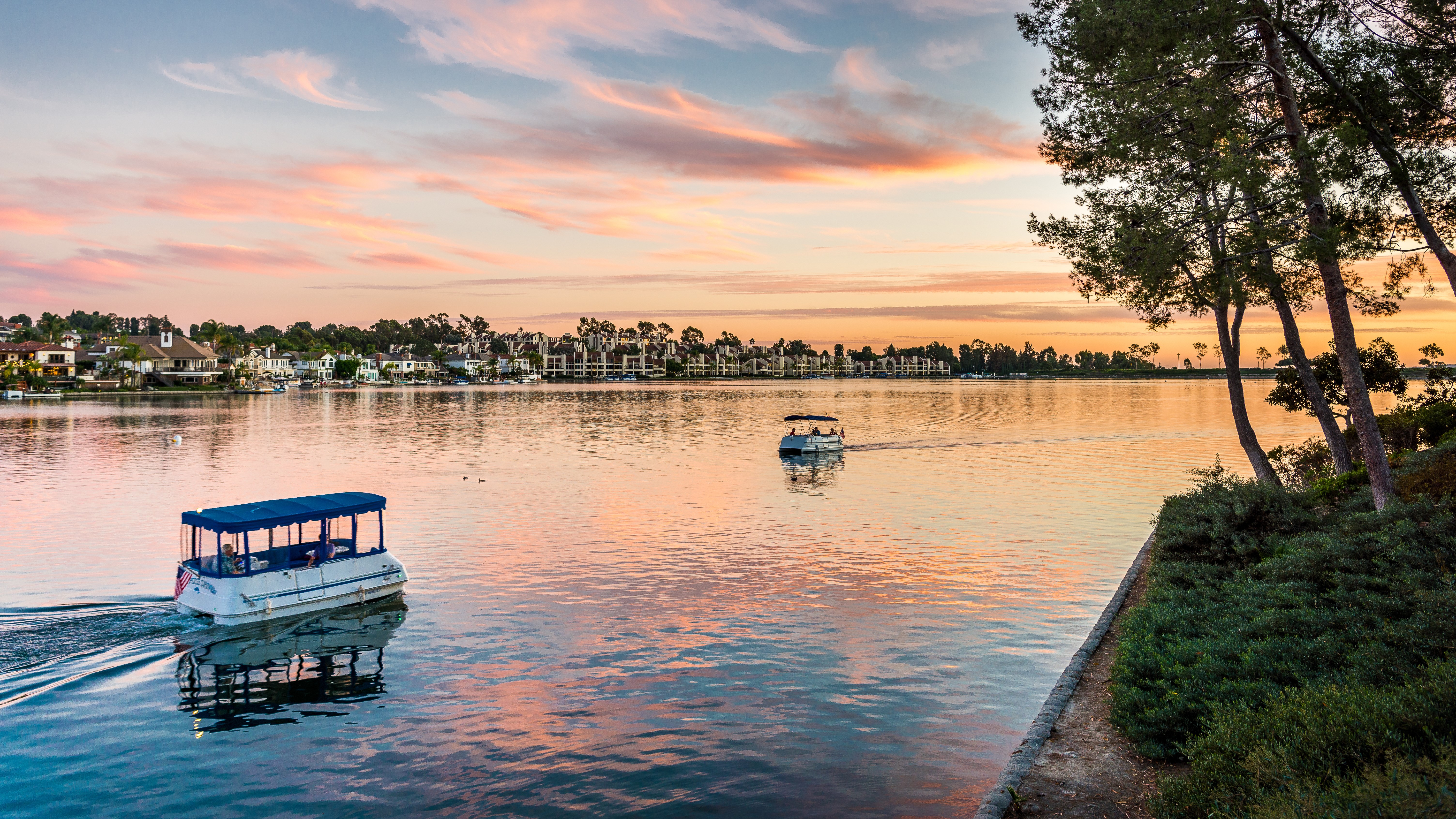 Two boats on Lake Mission Viejo at Sunset